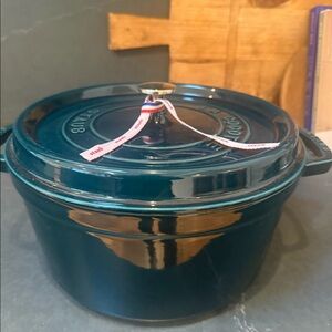 Never been used, brand new Staub Enameled Cast Iron Round Dutch Oven 7QT La Mer